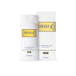 A bottle of cream and box on white background