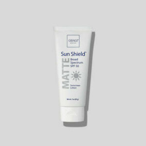 A white tube of sun shield spf 5 0 sunscreen.