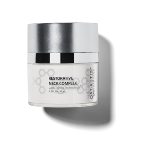 A bottle of restorative neck complex with black background